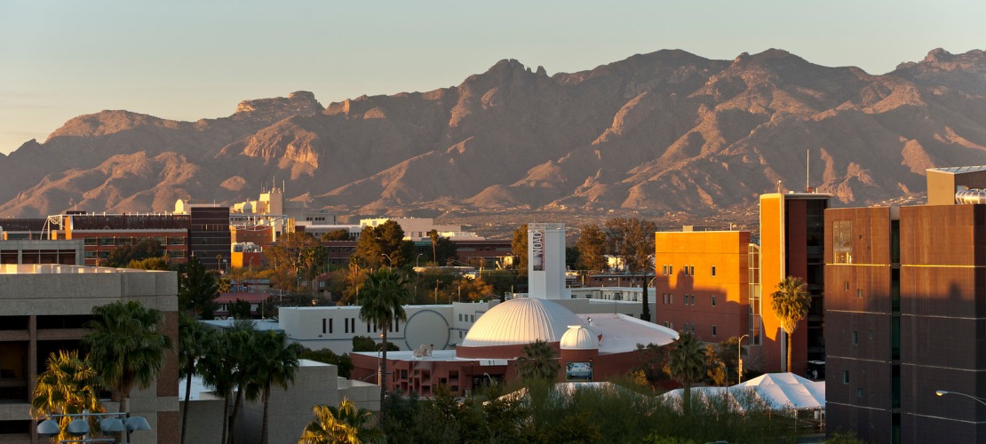 Photo of campus with mountains in background